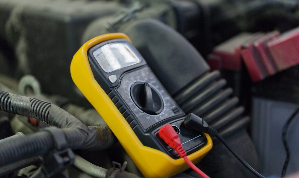 multimeter or voltmeter testing car battery