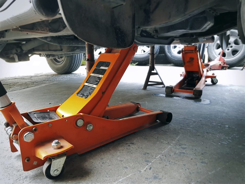 Orange Hydraulic Jacks for Car Repair Service